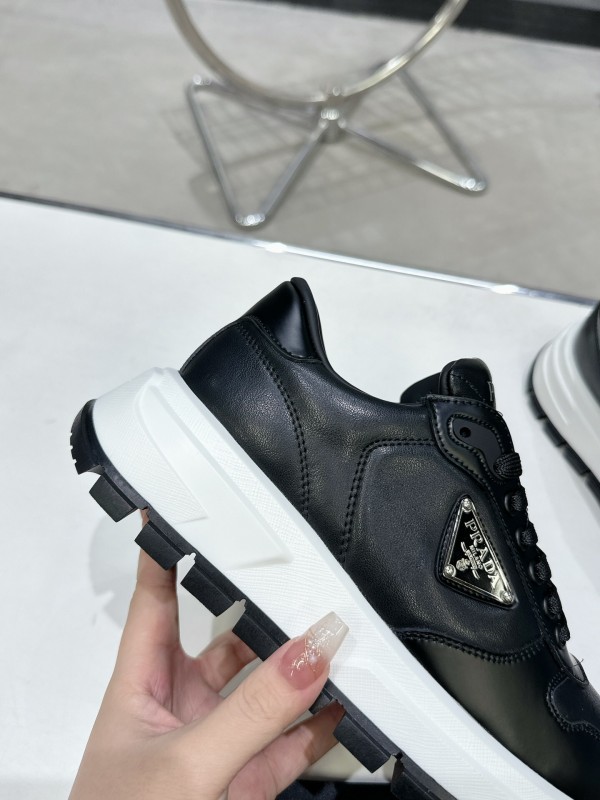 2025 Unisex Prada Black Leather Sneakers KFY00310