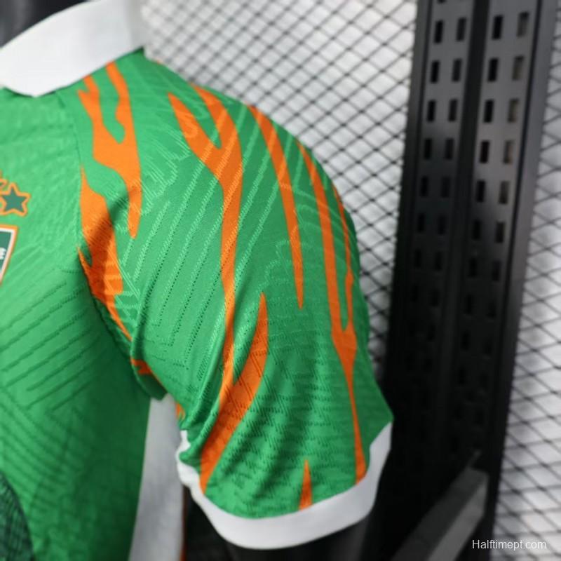 Player Version 2025 Ivory Coast Green with Elephant Graphic and Orange Trim Jersey